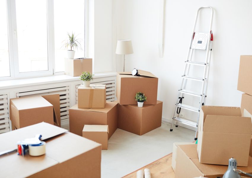 clear-room-with-boxes-and-ladder